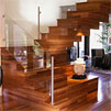 A striking, custom-built teak stairway, providing a real centerpiece for the ground floor